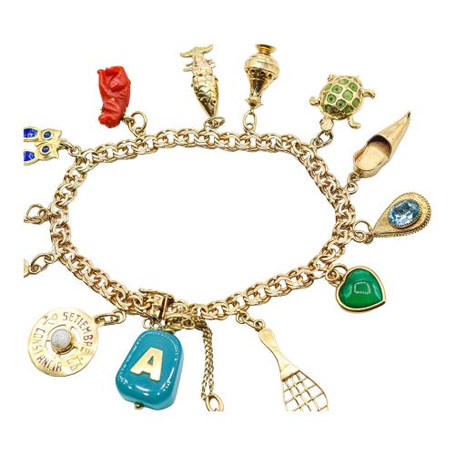 PULSERA CON COLGANTES DE LOS AÑOS 60