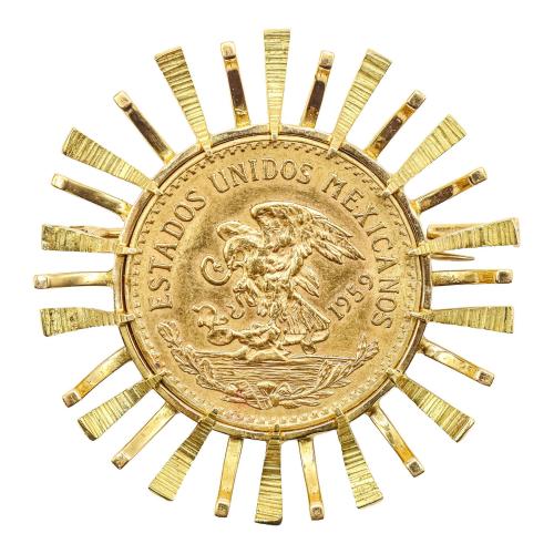 BROCHE CON MONEDA, DE LOS AÑOS 60
