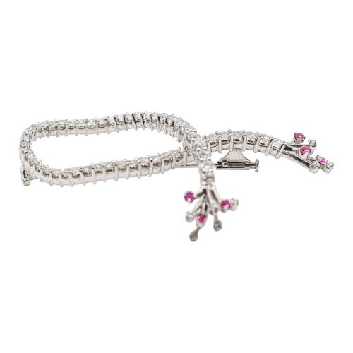 BROCHE LAZO CON BRILLANTES Y RUBÍES