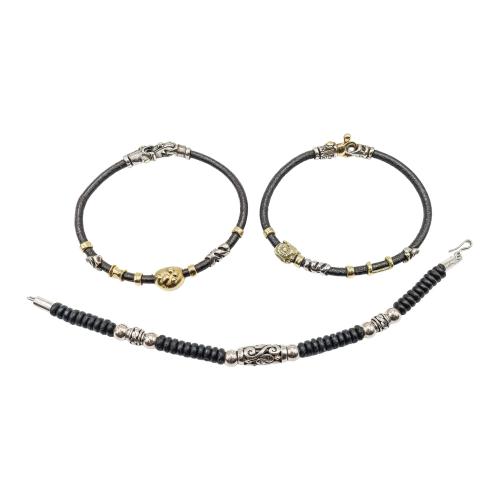 TRES PULSERAS DE PLATA Y ORO