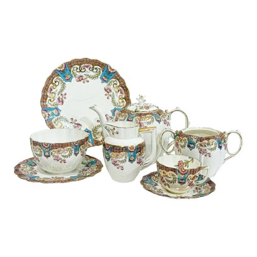 JUEGO DE CAFÉ EN PORCELANA CENTROEUROPEA PRIMER TERCIO S. XX