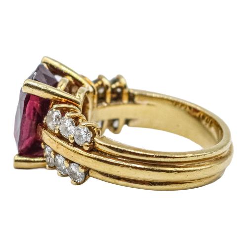 ANILLO CON GRANATE Y BRILLANTES