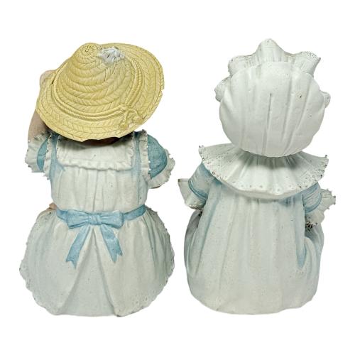 PAREJA DE FIGURAS DE BISCUIT DE PRIMER CUARTO S. XX