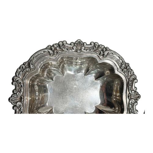 CUATRO CENTRITOS DE MESA EN PLATA DEL ÚLTIMO CUARTO DEL S.XX