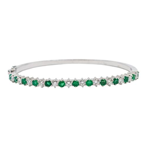 PULSERA ESCLAVA CON BRILLANTES Y ESMERALDAS, AÑOS 90