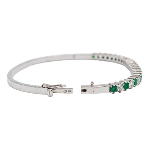 PULSERA ESCLAVA CON BRILLANTES Y ESMERALDAS, AÑOS 90